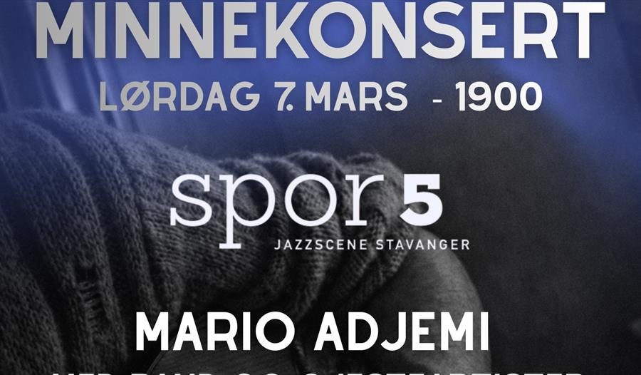 Annonse om konserten skrevet på bildet av hand som spiller gitar