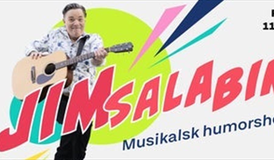 Jim Jacobsen med gitar og med Jimsalabim skrevet på