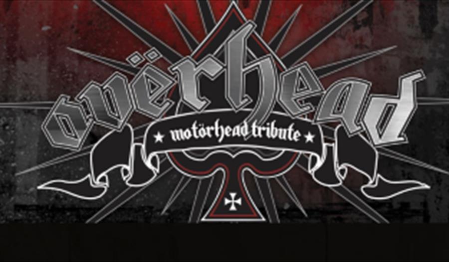 Annonse med OVERHEAD og motorhead skrevet på