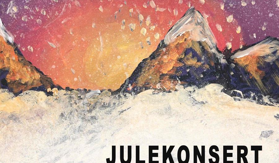 Bildet av snøfall i fjellene med Julekonsert skrevet på