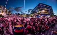 Utopia festival with a crowd of people on a concert