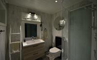 Moderne bad med stilreine detaljar i Hardanger Panorama Lodge.