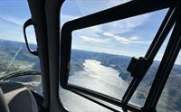Utsikt over Hardangerfjorden fra et helikopter